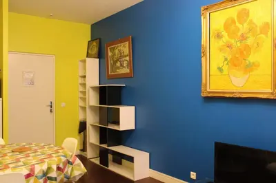 Un ou plusieurs lits dans un hébergement de l'établissement Colored Appt To Beaugrenelle
