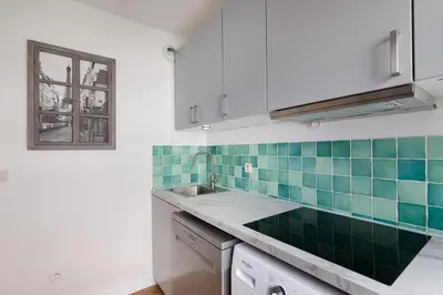 Cuisine ou kitchenette dans l'établissement Duplex Cosy 6 personnes - Parking Gratuit - 15 min Centre de Paris Metro 13
