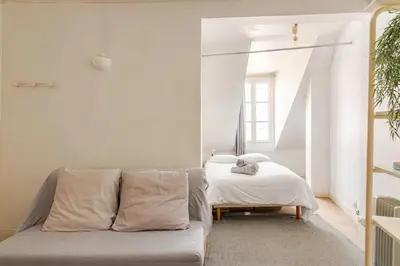 Un ou plusieurs lits dans un hébergement de l'établissement Appartement 4 personnes au centre Paris - Chatelet