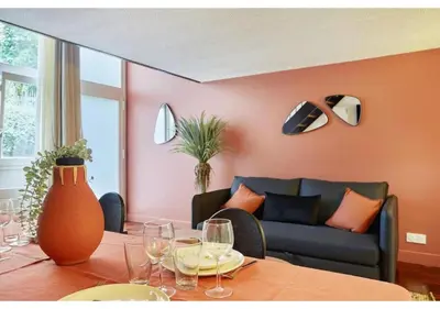 Coin salon dans l'établissement Apartment Le Marais Place des Vosges by Studio Prestige