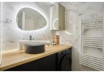 Salle de bains dans l'établissement Apartment Le Marais Place des Vosges by Studio Prestige