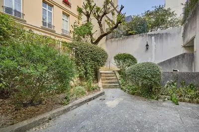 Jardin de l'établissement Apartment Le Marais Place des Vosges by Studio prestige