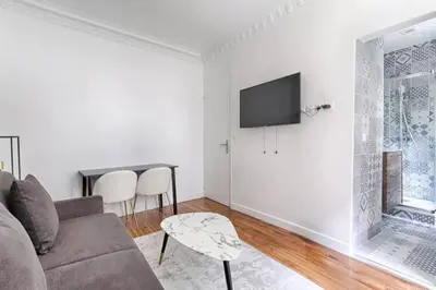 Télévision ou salle de divertissement dans l'établissement Montmartre/Natier : Cosy Studio 2P
