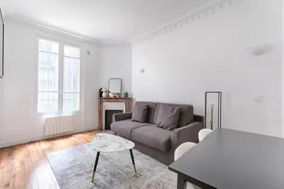Coin salon dans l'établissement Montmartre/Natier : Cosy Studio 2P