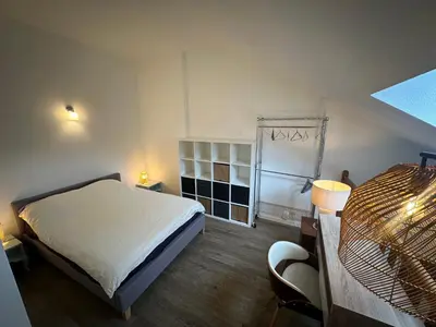 Un ou plusieurs lits dans un hébergement de l'établissement 2 pièces duplex Issy Les Moulineaux Ascenseur internet