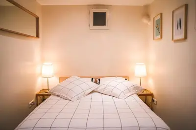 Un ou plusieurs lits dans un hébergement de l'établissement Charming souplex in Paris