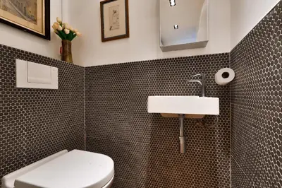 Salle de bains dans l'établissement Bright apartment in the 10Arr. - 4 people