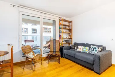 Coin salon dans l'établissement GuestReady - Appartement Chic avec Balcon