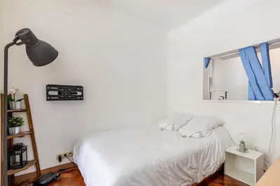 Un ou plusieurs lits dans un hébergement de l'établissement GuestReady - City Charm near Sacré-Cœur