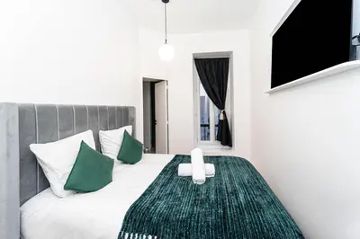 Un ou plusieurs lits dans un hébergement de l'établissement Pick A Flat's Apartment in Notre-Dame de Paris - Rue Saint-Séverin