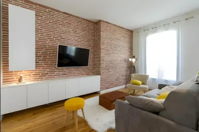 Télévision ou salle de divertissement dans l'établissement Appartement 2 pièces avec vue Tour Eiffel