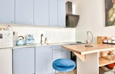 Cuisine ou kitchenette dans l'établissement Paris9