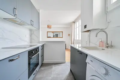 Cuisine ou kitchenette dans l'établissement CityStay-Confort- 5 min Metro -