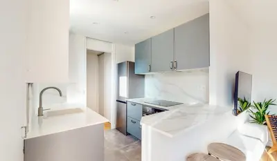Cuisine ou kitchenette dans l'établissement CityStay-Confort- 5 min Metro -