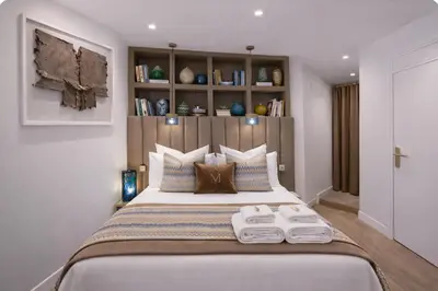 Un ou plusieurs lits dans un hébergement de l'établissement N Sublime appartement avec Sauna dans le 17e