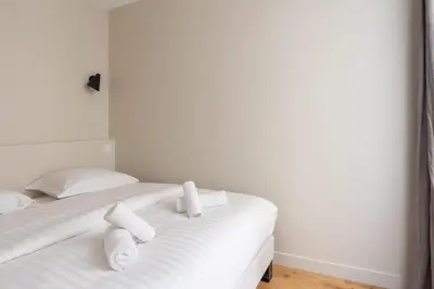 Un ou plusieurs lits dans un hébergement de l'établissement Modern and elegant 1BD Apartment near Montmartre