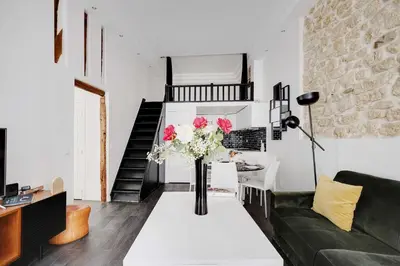Coin salon dans l'établissement Stunning apartment - 2BR-6P - Grand Boulevard