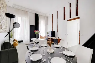 Coin salon dans l'établissement Stunning apartment - 2BR-6P - Grand Boulevard
