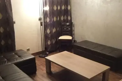 Coin salon dans l'établissement APPARTEMENT PORTE CHAMPERRET