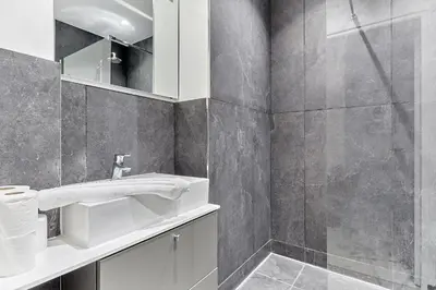 Salle de bains dans l'établissement Apartment Louvre by Studio prestige