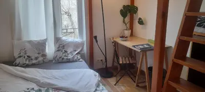 Un ou plusieurs lits dans un hébergement de l'établissement calme et repos, vue sur les arbres
