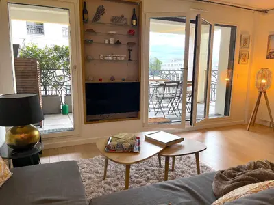 Coin salon dans l'établissement Le Penthouse de Levallois