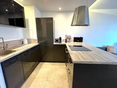 Cuisine ou kitchenette dans l'établissement Le Penthouse de Levallois