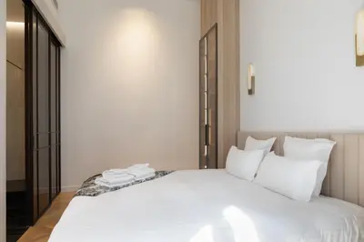 Un ou plusieurs lits dans un hébergement de l'établissement Pick A Flat's Apartment in Montorgueil - Rue Bachaumont