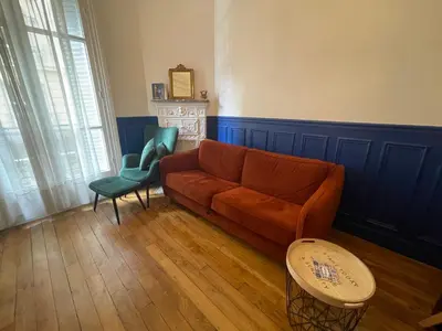 Coin salon dans l'établissement Large family typical Parisian Appartment
