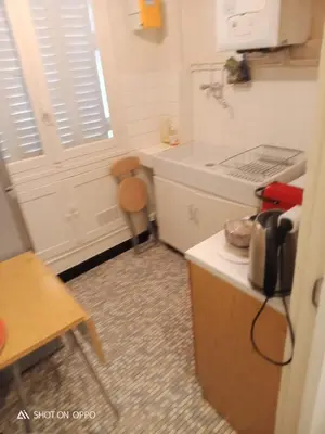 Cuisine ou kitchenette dans l'établissement Large family typical Parisian Appartment