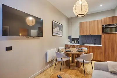 Cuisine ou kitchenette dans l'établissement Residence Center of Paris by Studio prestige