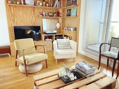 Coin salon dans l'établissement Appartement idéal JO à 10 min de Paris (metro 14)