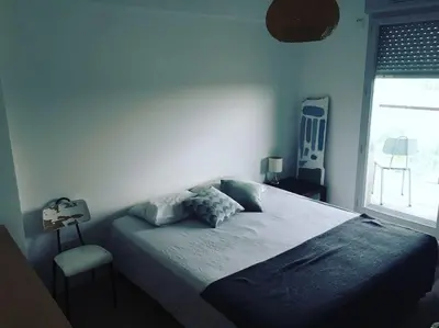 Un ou plusieurs lits dans un hébergement de l'établissement Appartement idéal JO à 10 min de Paris (metro 14)