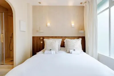 Un ou plusieurs lits dans un hébergement de l'établissement Fabuleux loft Blomet Tour Eiffel