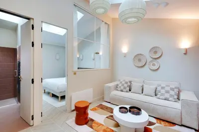 Un ou plusieurs lits dans un hébergement de l'établissement Fabuleux loft Blomet Tour Eiffel