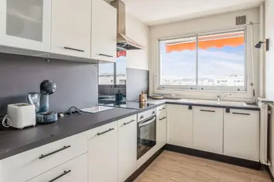 Cuisine ou kitchenette dans l'établissement Appartement Leroy balcon - Welkeys