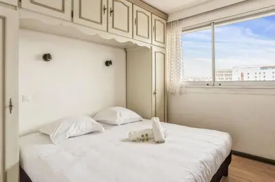 Un ou plusieurs lits dans un hébergement de l'établissement Appartement Leroy balcon - Welkeys