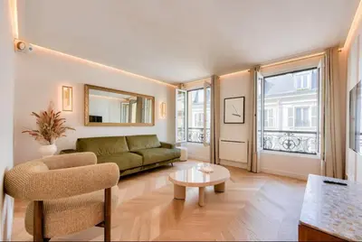 Coin salon dans l'établissement Luxury 1BR apartment - Champs Elysees