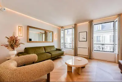 Coin salon dans l'établissement Luxury 1BR apartment - Champs Elysees