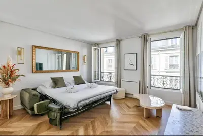 Coin salon dans l'établissement Luxury 1BR apartment - Champs Elysees