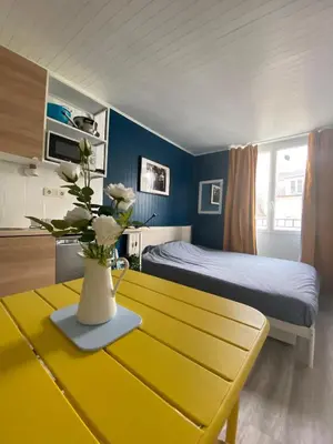 Un ou plusieurs lits dans un hébergement de l'établissement Bright Central Flat PARIS