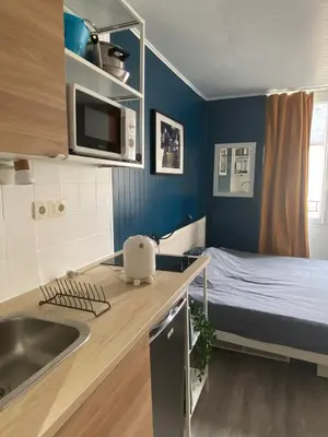 Un ou plusieurs lits dans un hébergement de l'établissement Bright Central Flat PARIS