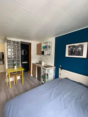 Un ou plusieurs lits dans un hébergement de l'établissement Bright Central Flat PARIS