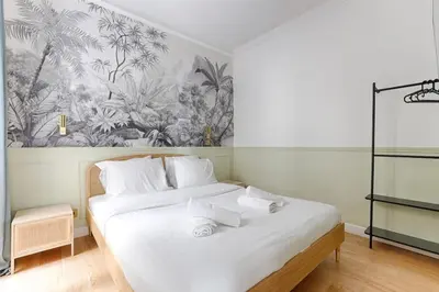 Un ou plusieurs lits dans un hébergement de l'établissement MyKeypers - Design & Cosy Flat 2BR Center Paris - Moulin Rouge