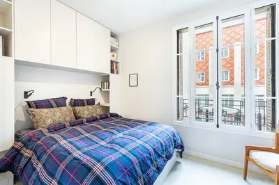 Un ou plusieurs lits dans un hébergement de l'établissement GuestReady - Bright Apt near Sacré-Coeur