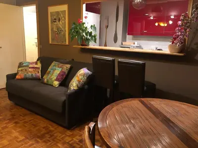 Coin salon dans l'établissement Chambre Privée avec salon Châtillon près de Paris