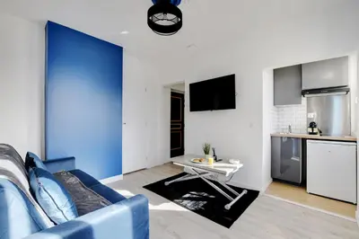 Cuisine ou kitchenette dans l'établissement Appartement Suite 41 aux Portes de Paris