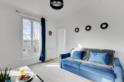 Coin salon dans l'établissement Appartement Suite 41 aux Portes de Paris