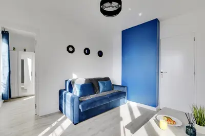 Coin salon dans l'établissement Appartement Suite 41 aux Portes de Paris