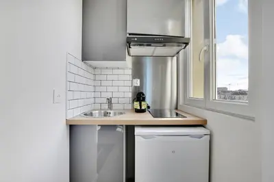 Cuisine ou kitchenette dans l'établissement Appartement Suite 41 aux Portes de Paris